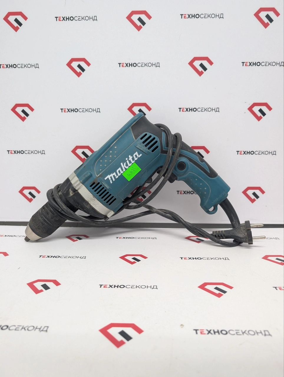 Ударная дрель Makita HP1631