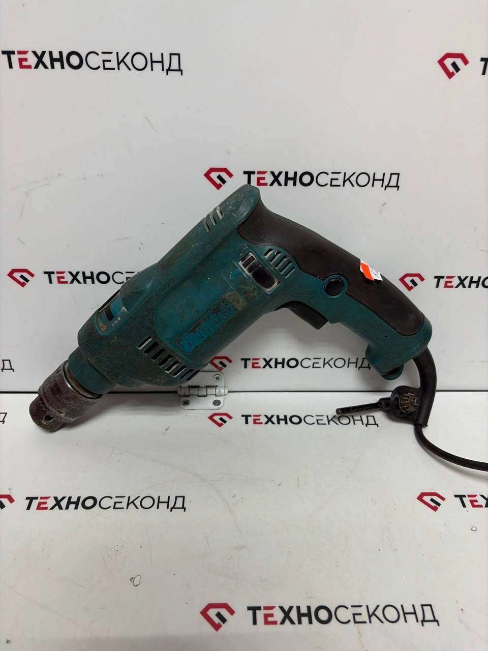 Ударная дрель Makita HP1620