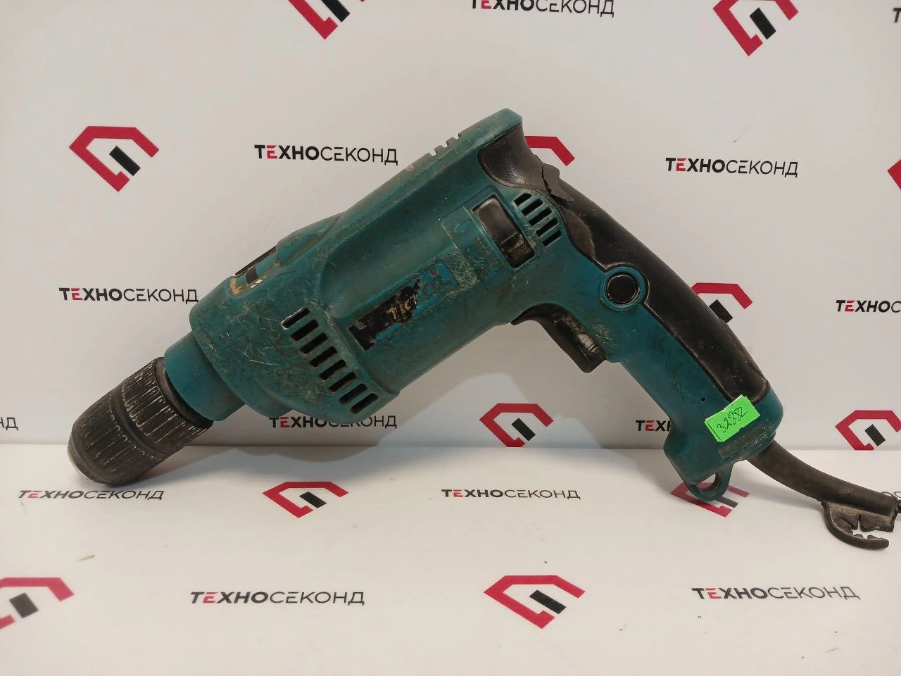 Ударная дрель Makita HP1620