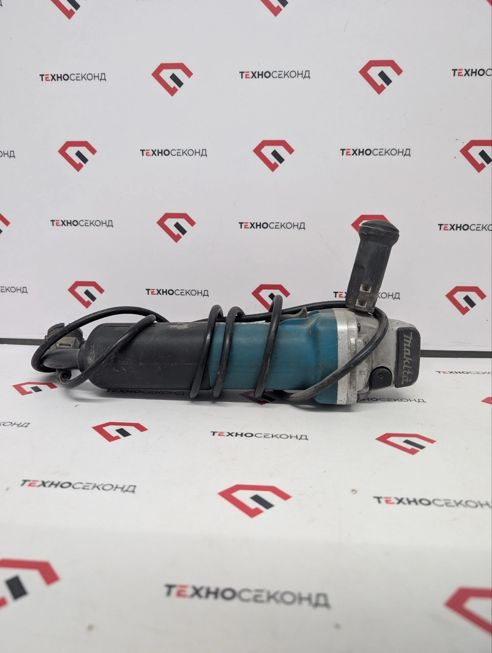 Угловая шлифмашина Makita 9558HN
