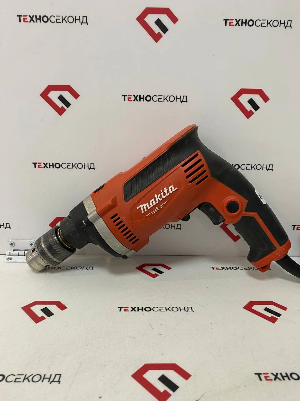 Ударная дрель Makita MT M8100